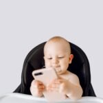 baby looking at phone