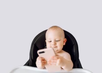 baby looking at phone