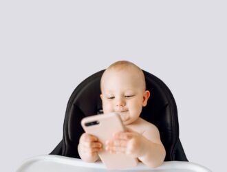 baby looking at phone